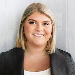 Dana Strachan in a Recent Graduate of the University of Minnesota and a Graphic Designer for Great Clips Inc. in Minneapolis. Dana Strachan in a Recent Graduate of the University of Minnesota and a Graphic Designer for Great Clips Inc. in Minneapolis.